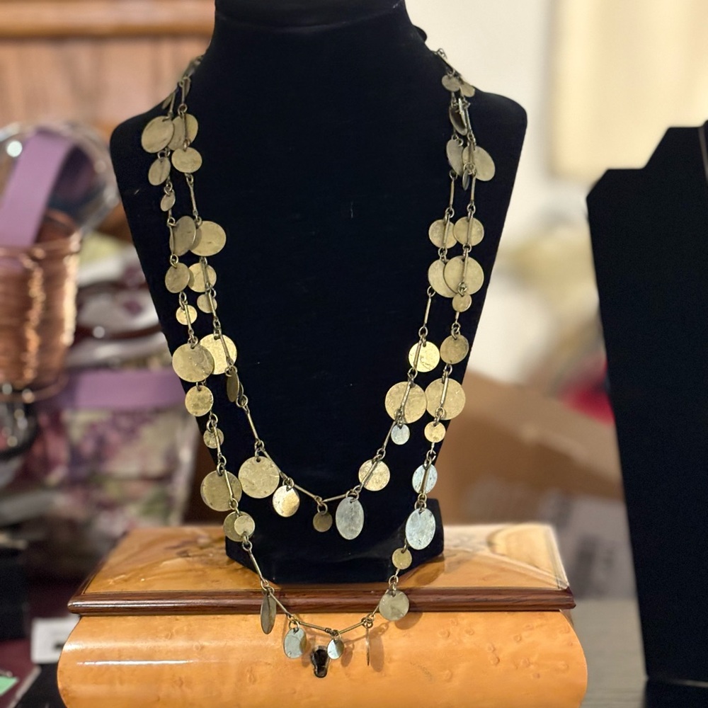 Vintage brass two strand necklace approximately 18” at the smallest.